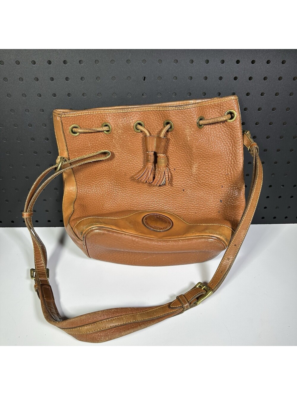 Vintage Dooney & Bourke  All-Weather Leather Drawstring Bucket Bag Tan Brown